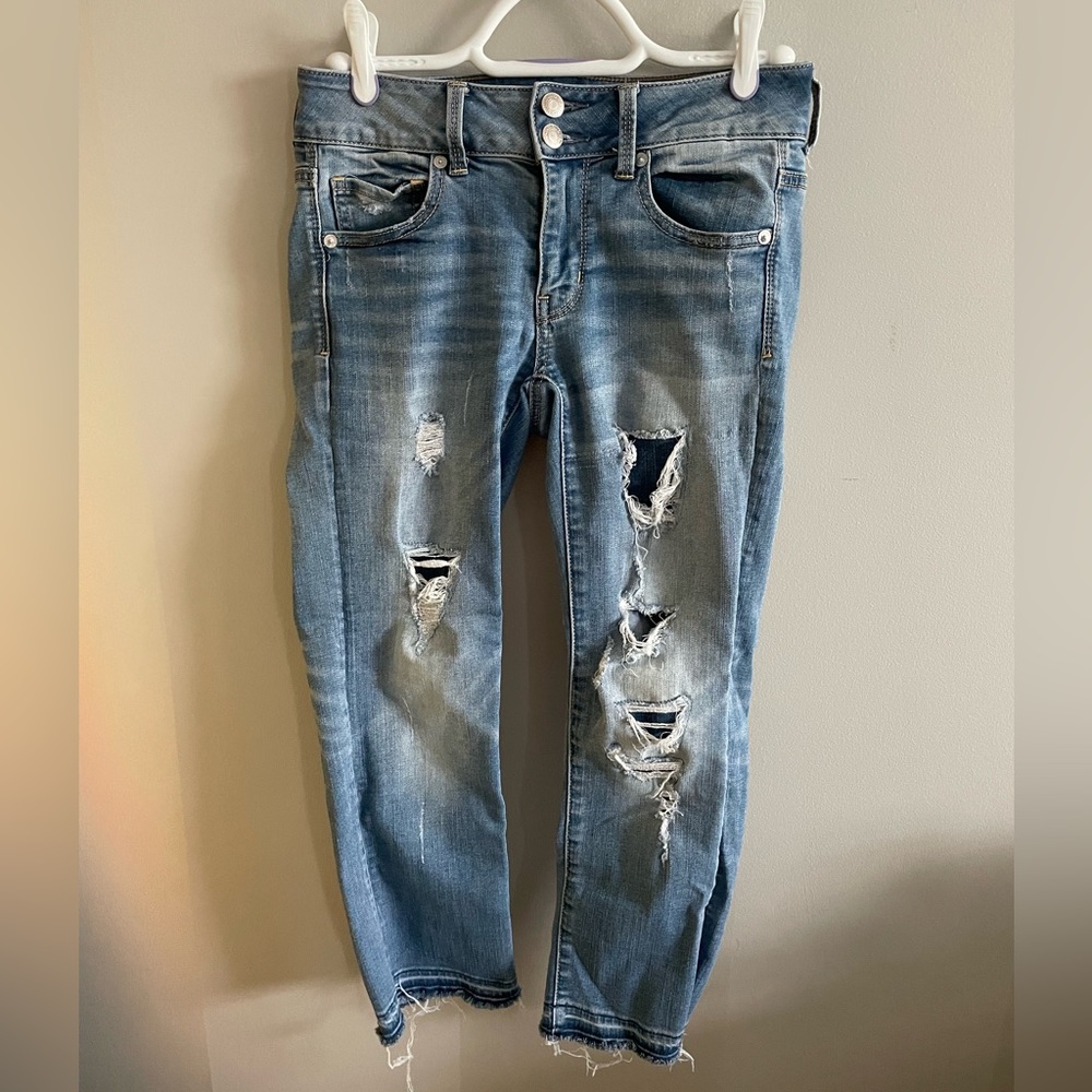American Eagle low rise skinny ripped jeans.